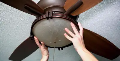 Ceiling fan repair and reinstallation on ceiling mount in Savannah, GA