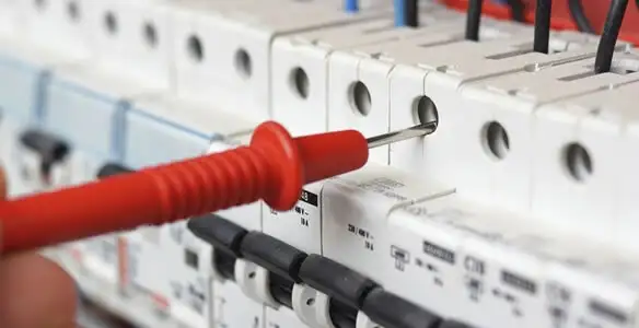 Electrical contractor testing circuit breakers during electrical repair in Rincon, GA