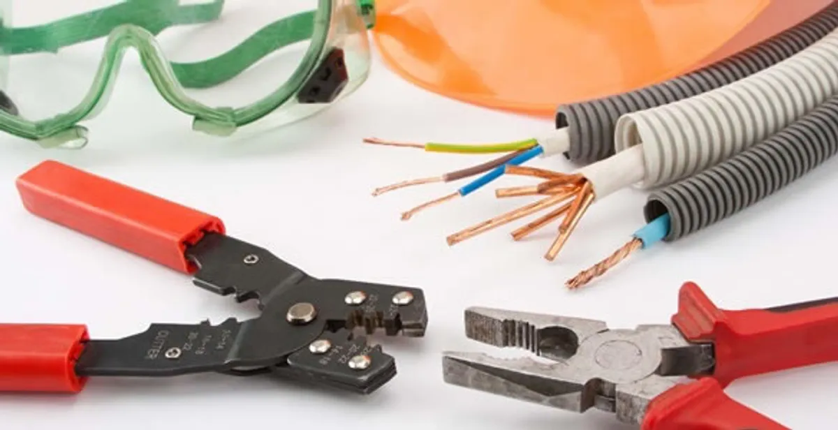 Electrical wiring repair with professional tools and safety equipment in Bloomingdale, GA