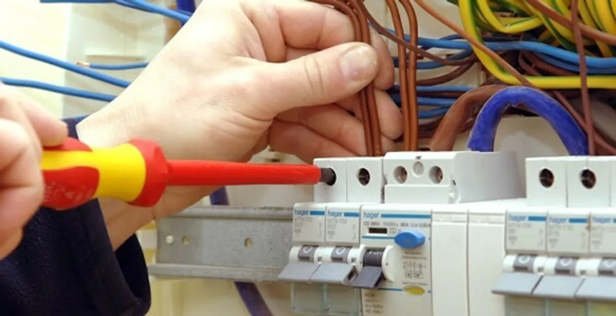 electrician services performing professional electrical panel wiring and connections in Savannah, GA