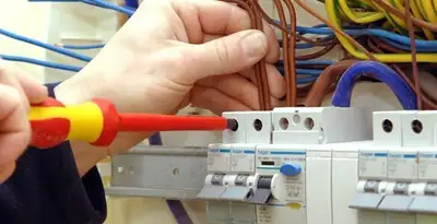 electrician services performing professional electrical panel wiring and connections in Savannah, GA