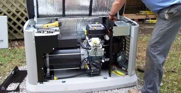 generator installation service showing technician connecting and configuring generator components in Savannah, GA