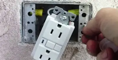 gfci circuits service showing installation of a ground fault circuit interrupter outlet by licensed electricians in Savannah, GA