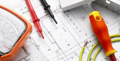 licensed electrician planning and testing electrical systems using professional tools in Savannah, GA