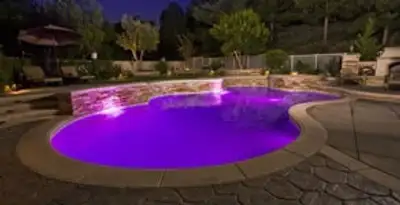 pool light installation and repair services illuminating a residential swimming pool in Savannah, GA
